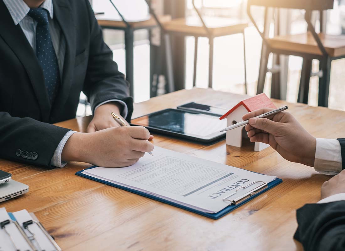 Real Estate Investor Insurance - Business Meeting of Real Estate Brokers and Company Presidents to Select a Model to Build a Housing Estate for Investment Opportunities