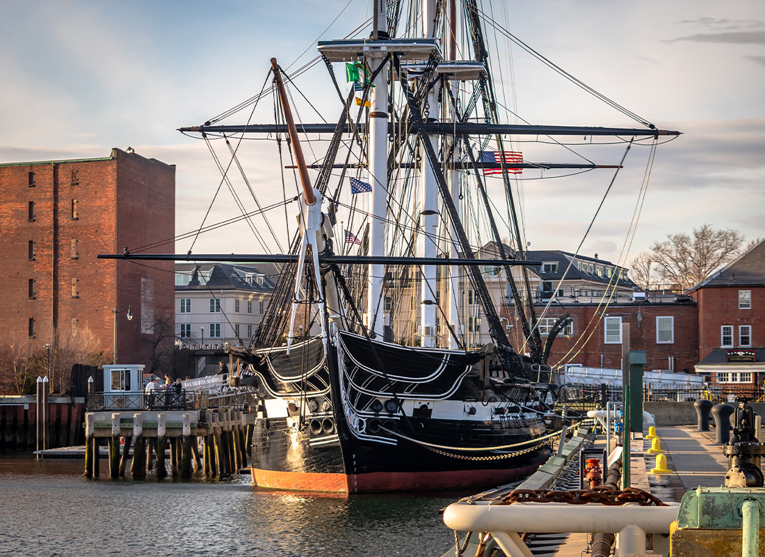 About Our Agency - The Uss Constitution Docked in Boston